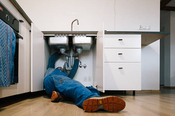 Professional Emergency Plumber technician working in Falcon, MS